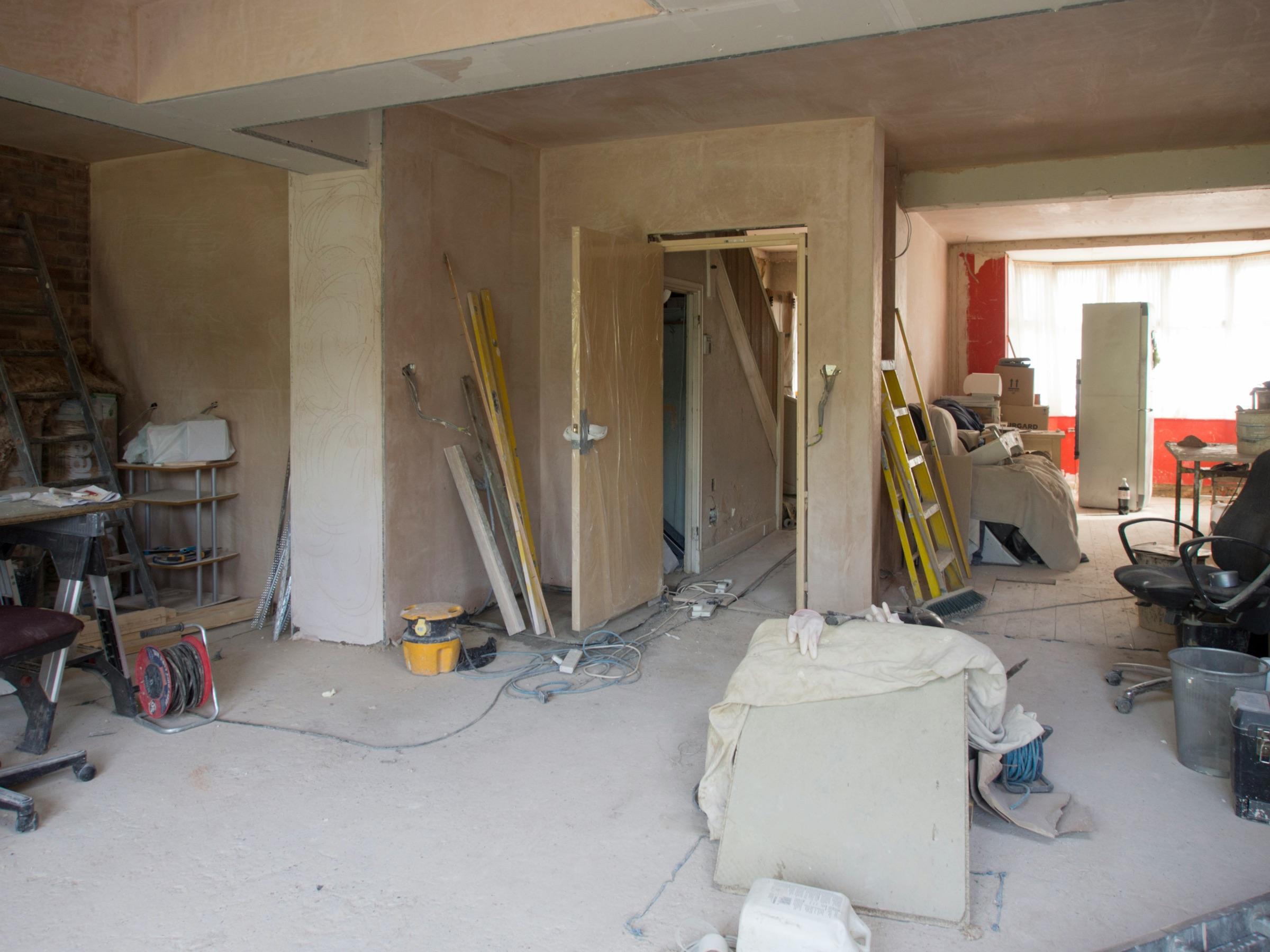 Home interior mid-renovation, prepared for repair work